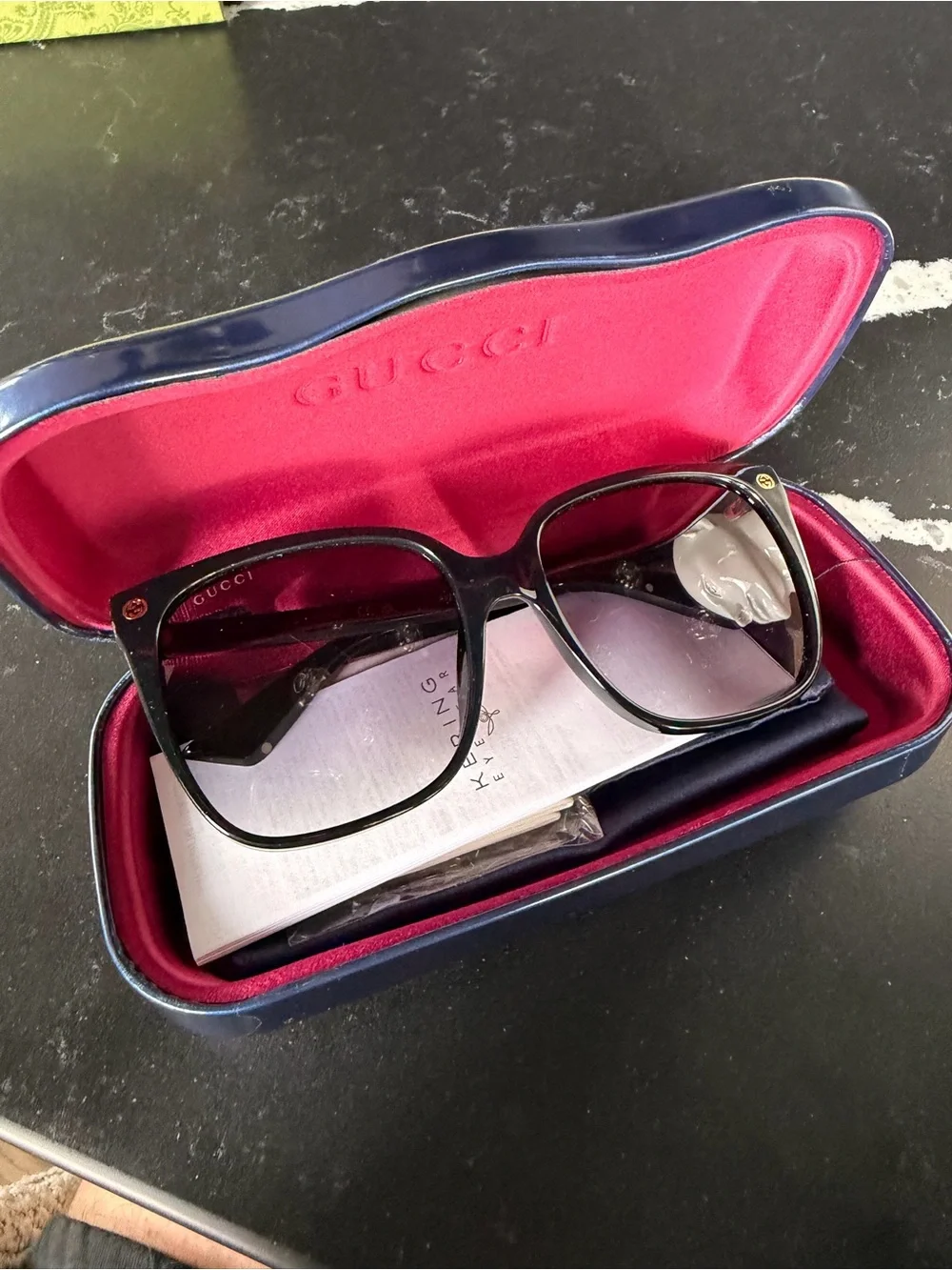 Gucci Black Frame Sunglasses with Gradient Purple Lenses